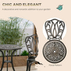 Bronze-tone ornate chair with floral-style filigree back for bistro set
