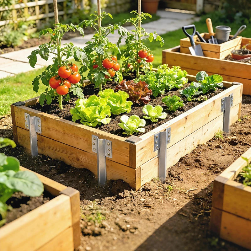 Silver steel stake brackets securing a raised garden bed with timber sides