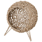 Ball-shaped woven wicker cat bed with pale cushion and three slender tripod legs