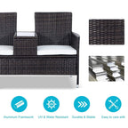 Dark brown rattan loveseat with white cushions and square middle table with glass top