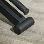 Black deadlift barbell jack close-up of rubber feet for stable floor contact