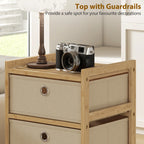 Cream fabric drawer chest with bamboo frame and top guardrails, two drawers with round pulls