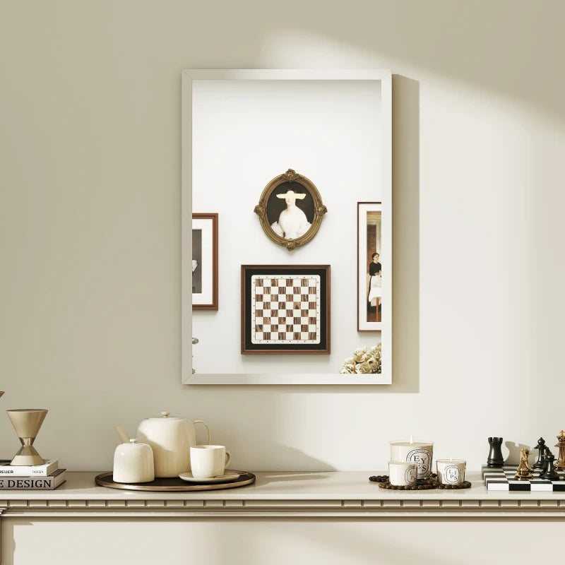 White framed rectangular wall mirror reflecting decor and a chessboard