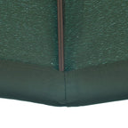 Green parasol fabric hem with stitched edge and central support pole