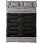 Double sleeping bag with two pillows, black and grey; quilted front view.