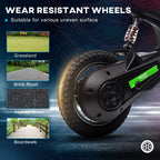 Rear wheel of green electric dirt bike with knobby tire, hub, and coil suspension