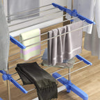 Blue four-tier clothes horse with side arms and lower rack for folded laundry