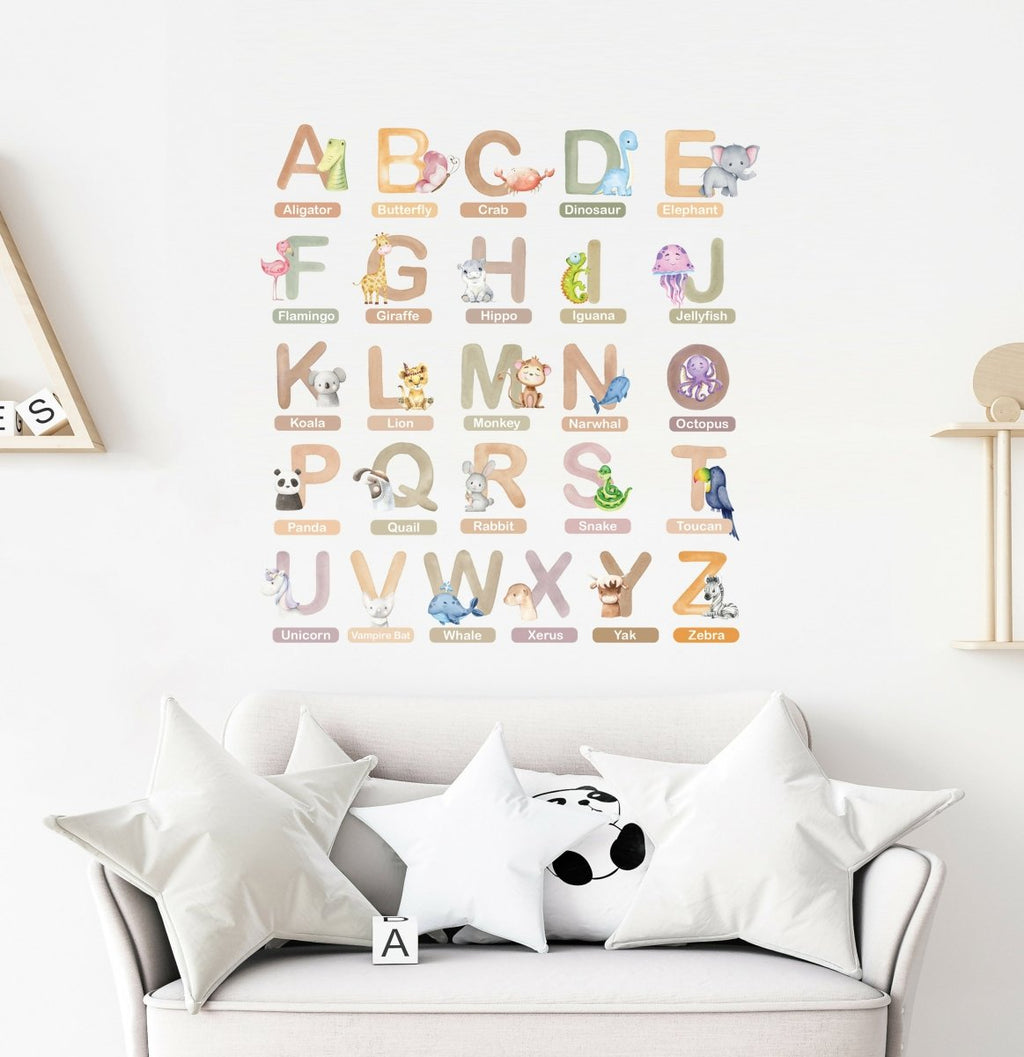 Animal alphabet wall stickers on wall above sofa, colorful A–Z letters with animals