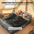 Double sleeping bag with two pillows laid open, black and grey quilted comfort.