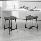 Two grey bar stools with curved padded seats and black metal frames