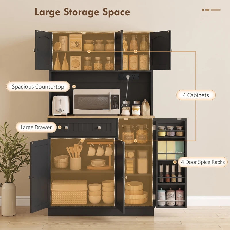 Black kitchen cupboard with open doors, drawers, counter space, and spice storage racks