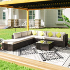 Outdoor brown rattan corner sofa set with white cushions, lime pillows, and glass-top table