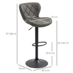 Dark grey swivel bar stool with diamond tufted backrest, footrest, and round base