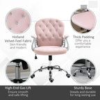 Pink velvet swivel office chair with tufted back, thick padding, and chrome rolling base