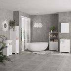 White bathroom vanity with under-sink cabinet storage and large countertop sink bowl