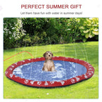 Red circular dog splash pad with white paw-print rim and dark pool base on grass