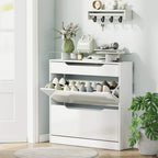 White shoe storage cabinet with open flip-door compartment and pull-out drawer showing shoe slots
