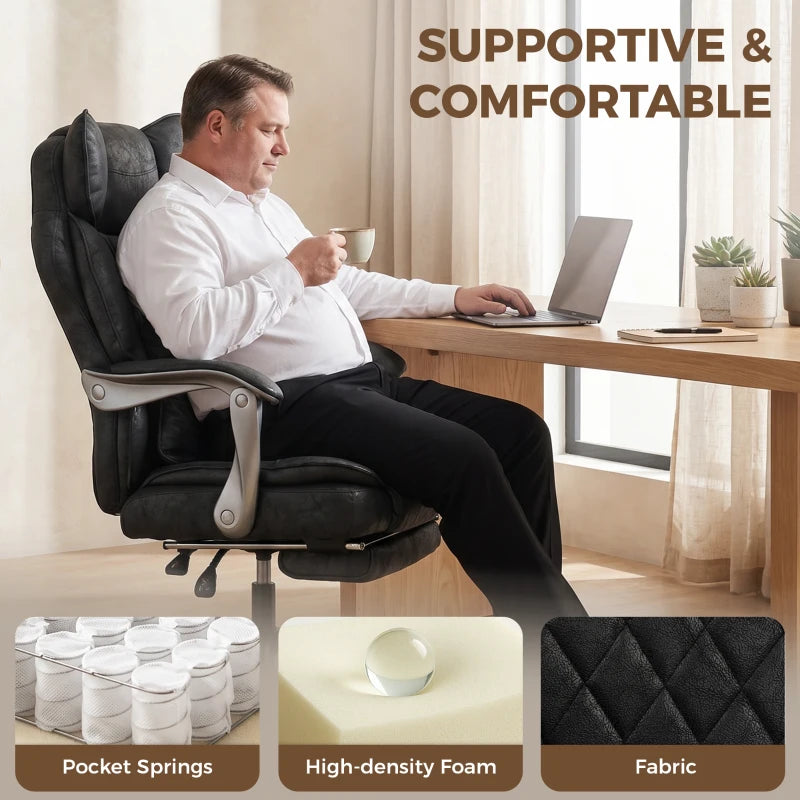 Black office chair with lumbar support, quilted back detail, and armrests