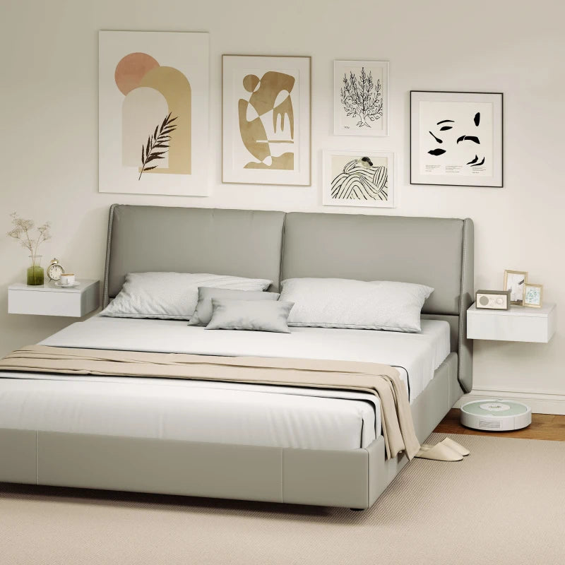 White floating nightstand pair with drawers, mounted on wall beside bed