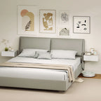 White floating nightstand pair with drawers, mounted on wall beside bed
