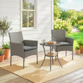 Dark grey rattan bistro conversation set with two chairs and a two-tier glass table