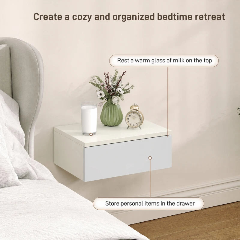 White floating nightstand with drawer and flat top, mounted on wall