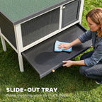 Grey wooden rabbit hutch with slide-out tray base for easy cleaning
