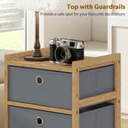 Narrow bamboo-framed chest of drawers with four light grey fabric drawers
