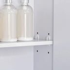 Interior view of white mirror cabinet with storage shelf and two open-door compartments.