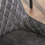 Close-up of grey quilted diamond stitching on the backrest of a PU leather side chair