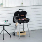 Black lidded charcoal grill open for cooking with food on grates and wheels on legs