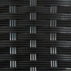 Close view of black woven wicker pattern on a square table top