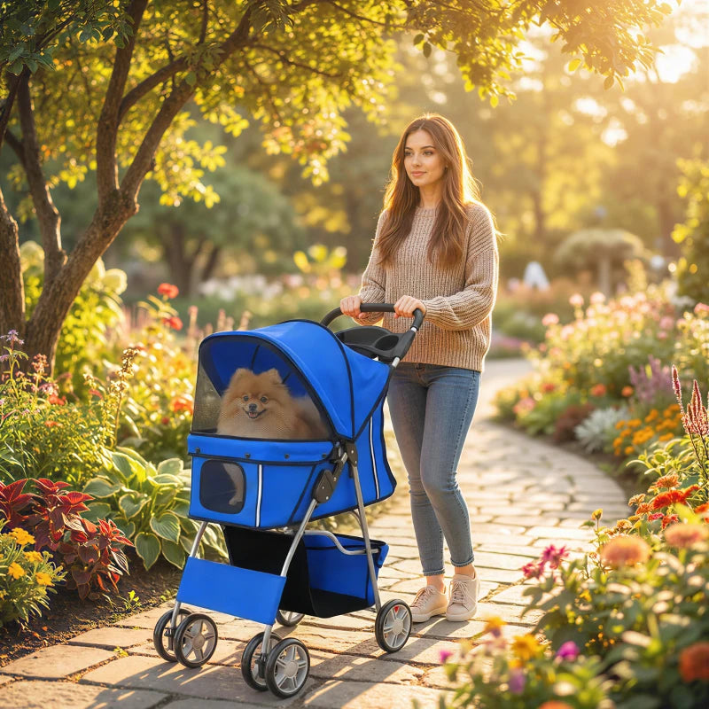 Blue pet stroller with canopy and mesh sides, parked on a garden path