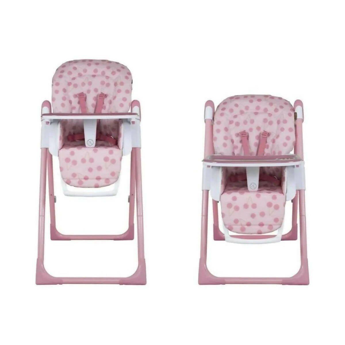 Two views of cherry pattern infant highchair with pink frame and white tray