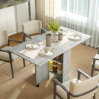 Grey drop-leaf dining table with two side shelves, on rolling casters in a dining setup