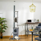 Light grey tall cat tree with stacked houses, sisal scratching posts, and perches