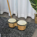 Two natural wood bongos with light drumheads on a shag rug