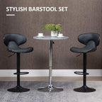 Pair of grey bar stools with rounded backrests, black pedestal bases, and footrest rings