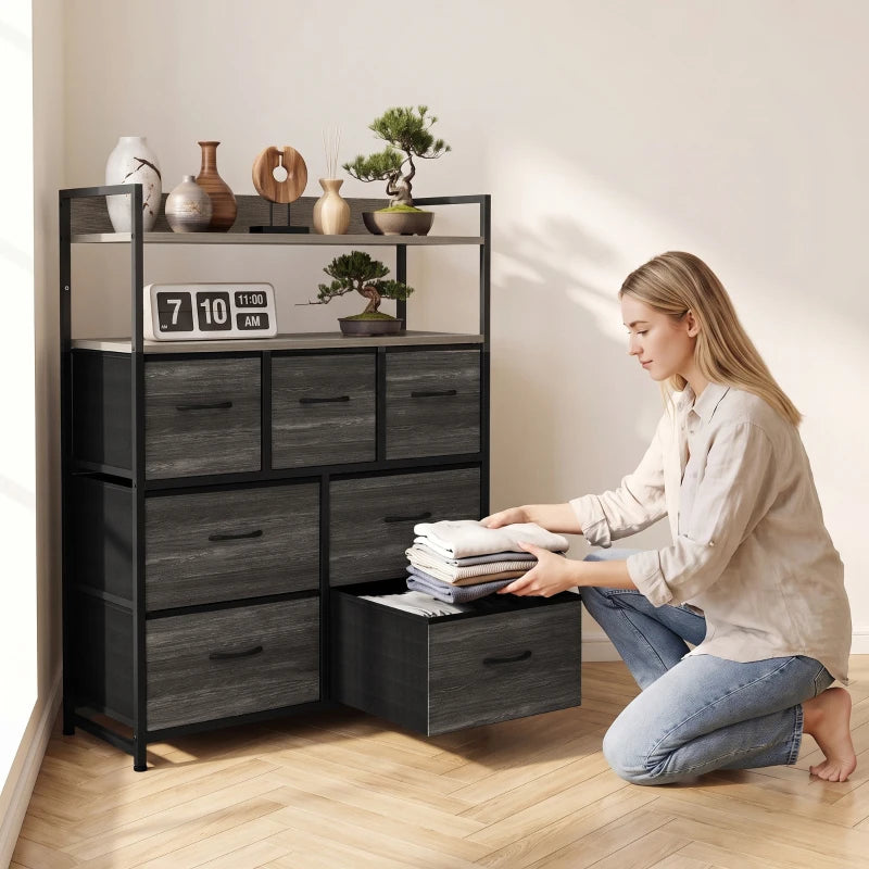 Grey wood-effect dresser with open shelves and 7 fabric drawers, room setup view