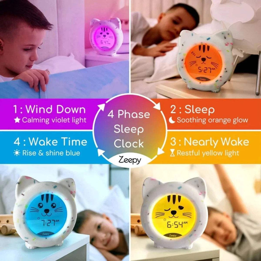 White cat sleep clock with warm orange glowing time screen and confetti dots