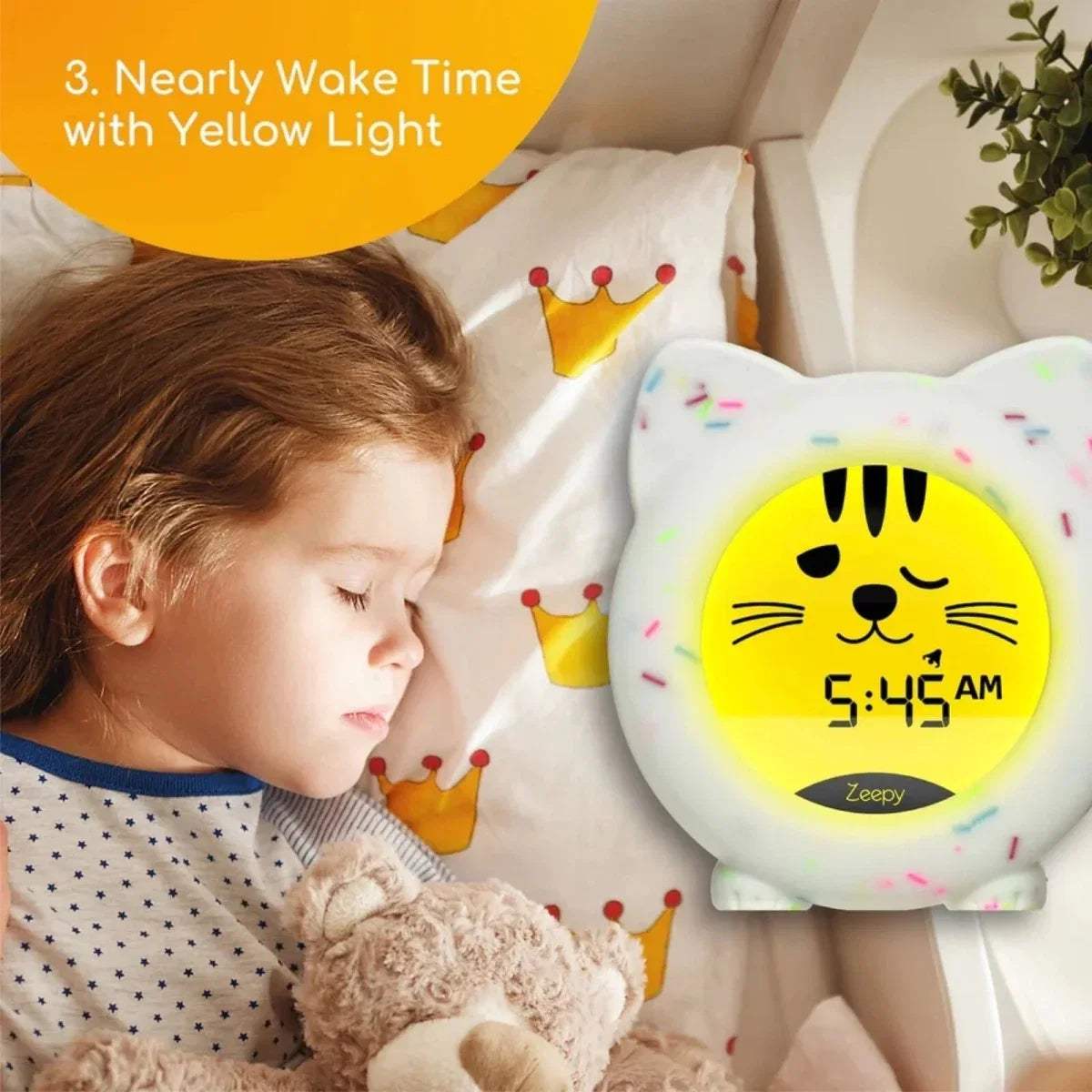 White cat-shaped sleep clock with bright yellow glow time screen and striped whiskers