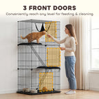 Black 3-tier cat cage with front door access; cat on top platform
