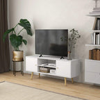 White TV stand cabinet with open shelves and storage drawers beneath a mounted TV.