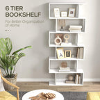 White 6-tier bookshelf with open shelves displaying books, frames, and vases