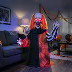 Halloween animatronic clown with orange hair, glowing red eyes, open-mouthed grin, raised arms