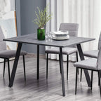 Charcoal grey rectangular dining table with metal legs and spacious tabletop