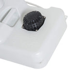 Close-up of black foot pump on white wastewater tank base of portable sink