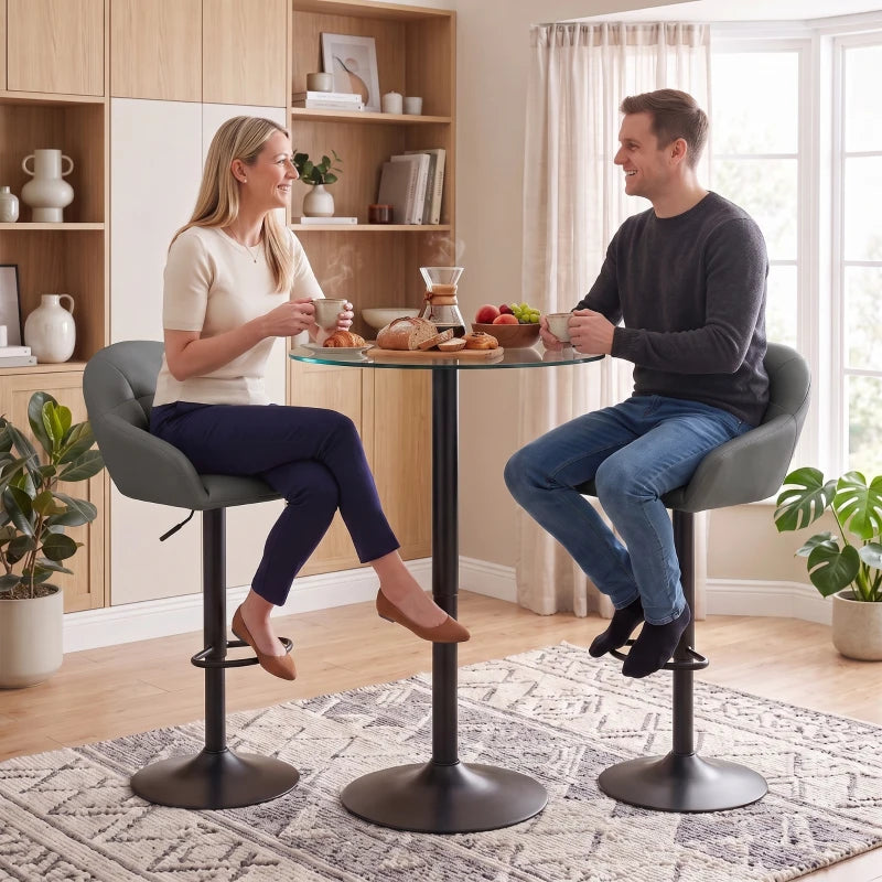 Grey bar stool pair with padded seats, curved backrests, armrests, and round bases