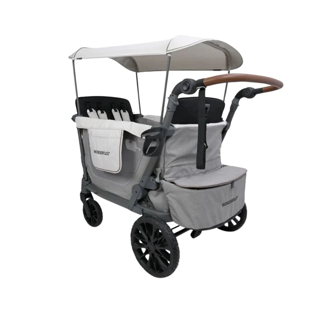 Grey quad stroller wagon with canopy and padded seats; front wheels and handle visible
