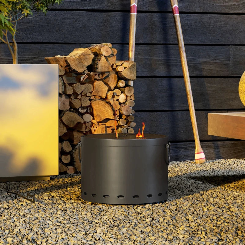 Dark grey fire pit with burning coals and open center
